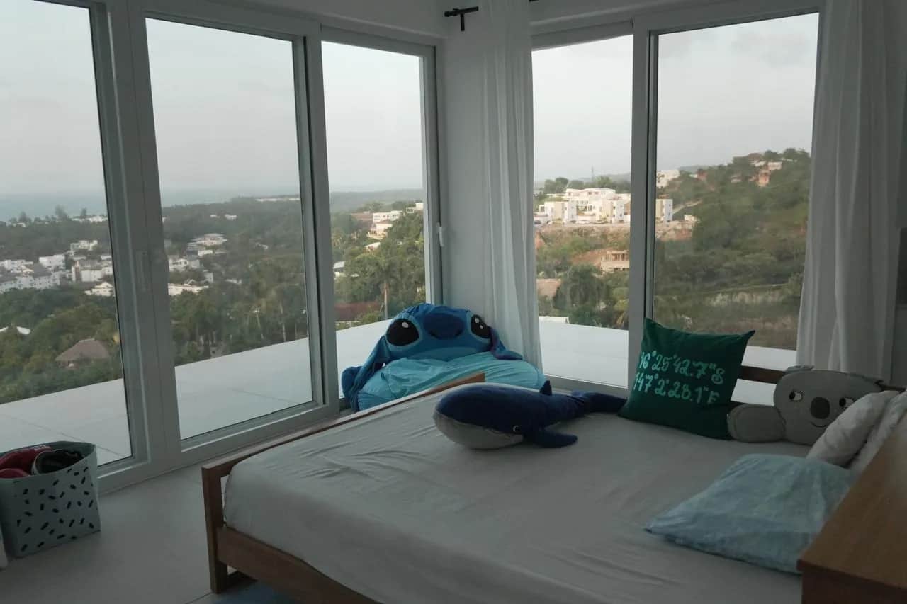 Kids bedroom with corner windows